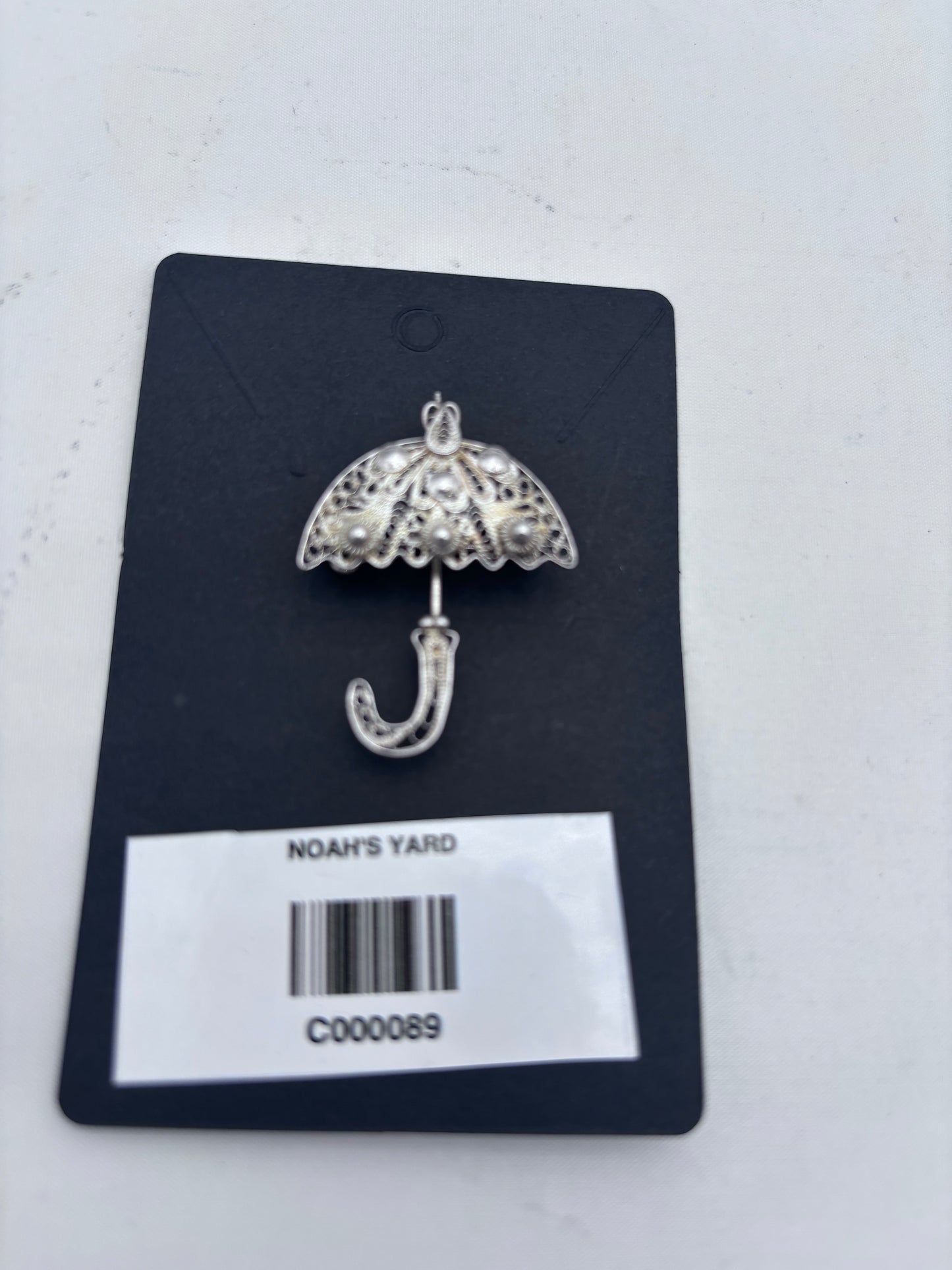 Silver filigree umbrella brooch
